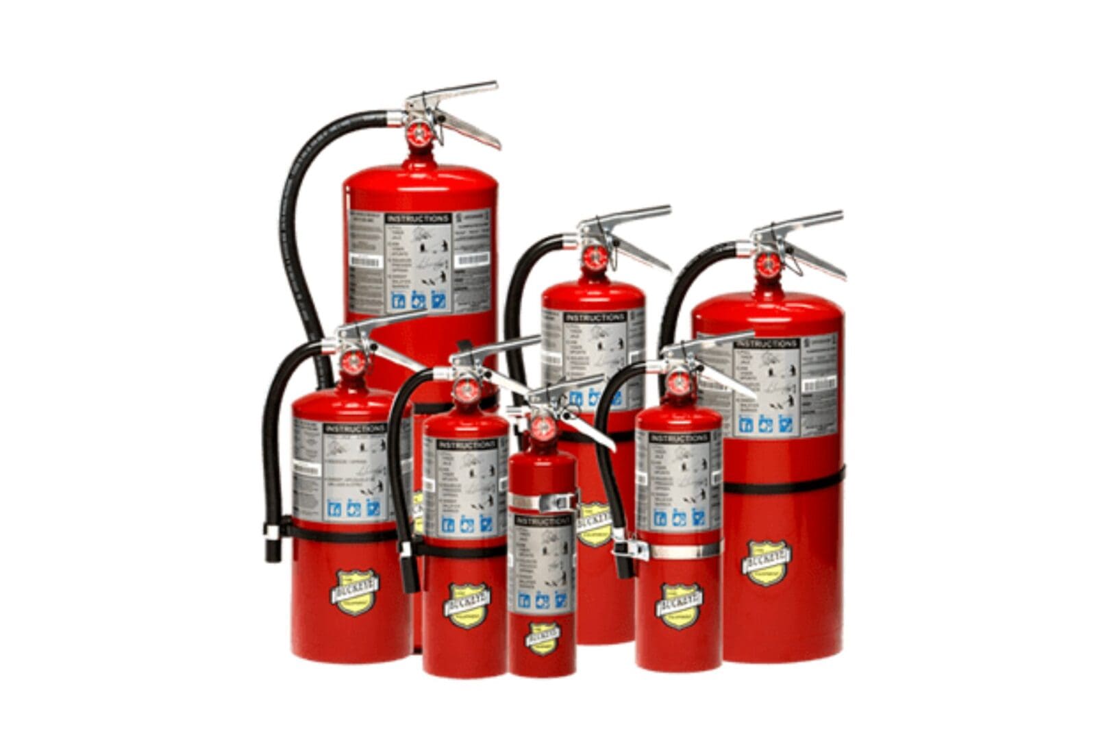 Various red fire extinguishers of different sizes grouped together.