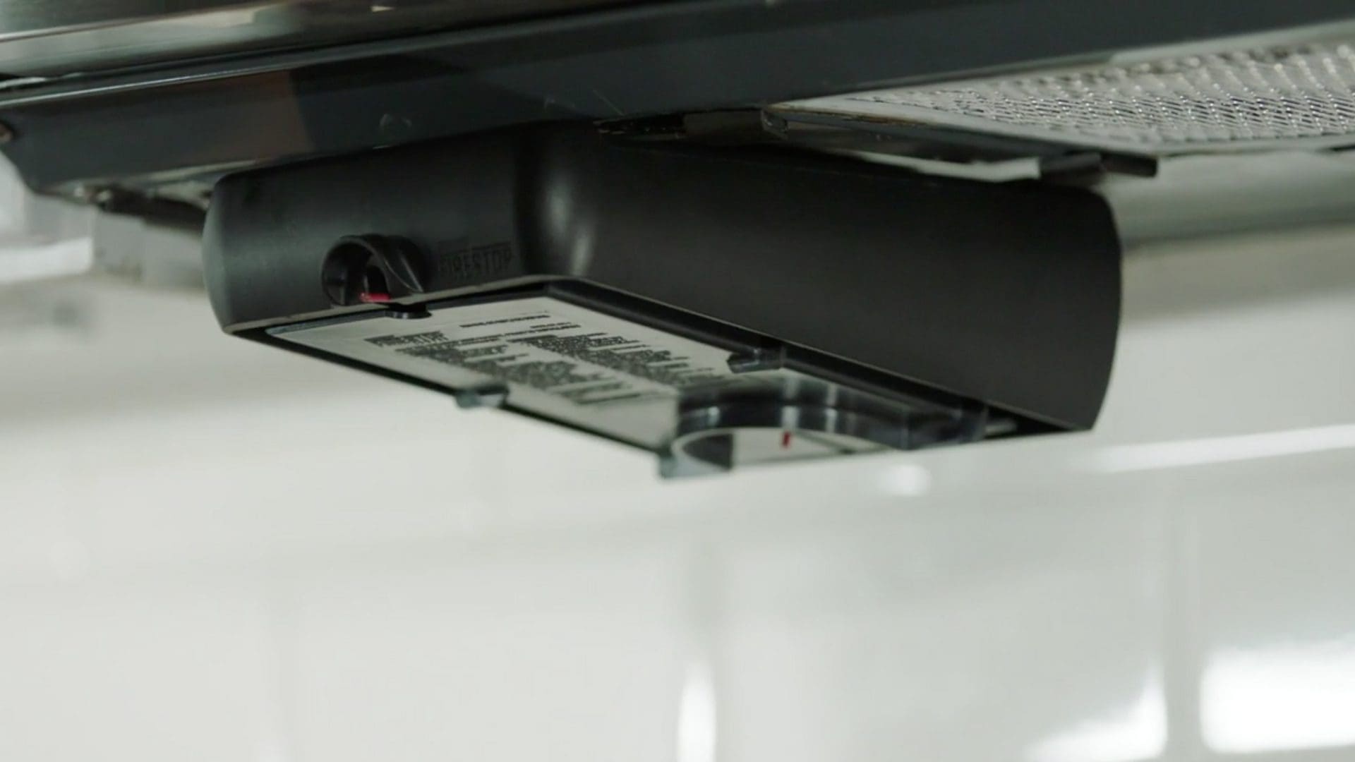 Close-up of a printer scanning a document.