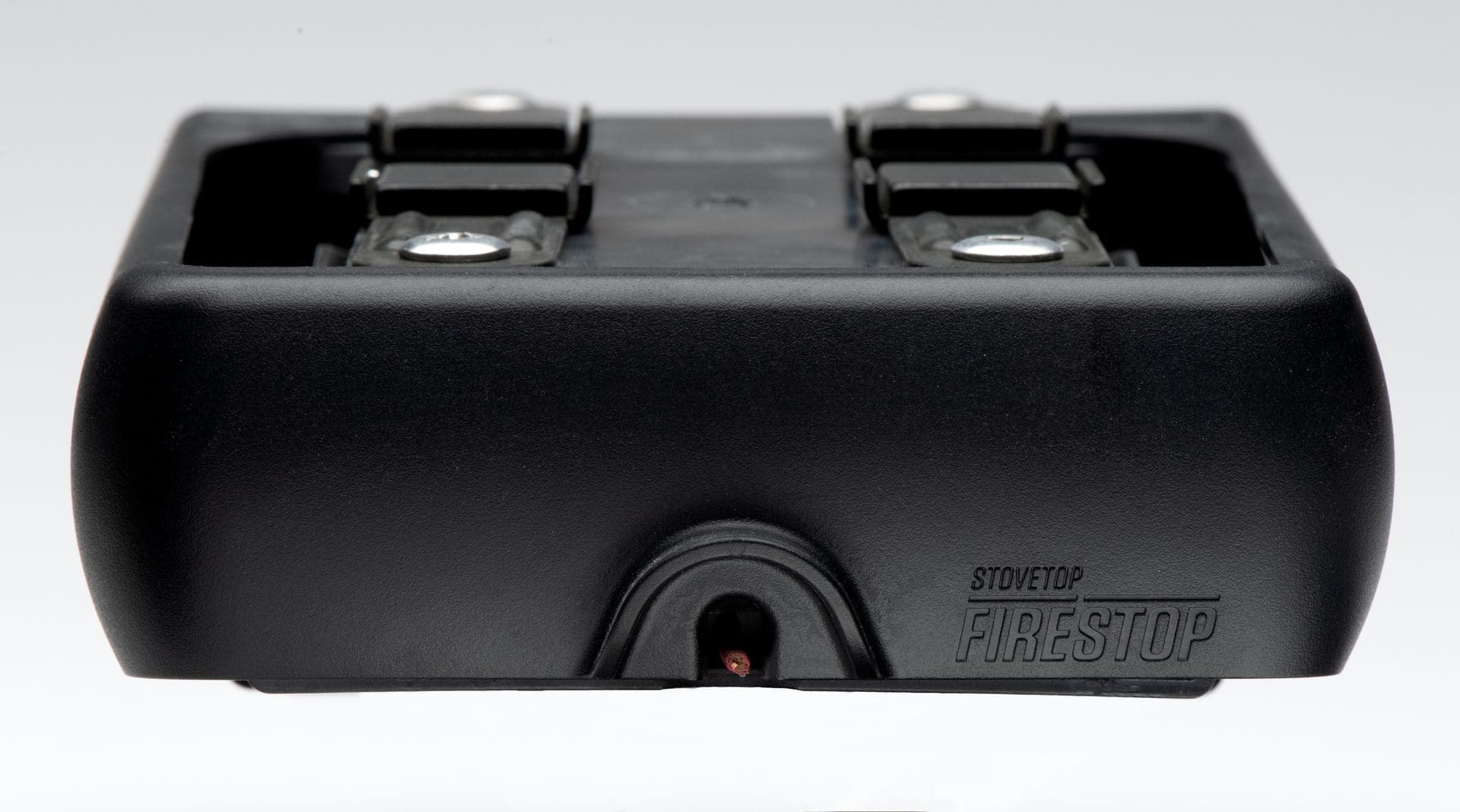 Close-up of a black vintage camera focusing lens.