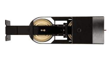 Ceiling-mounted black speaker, top view.